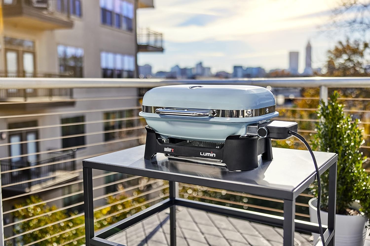 image:imageWeber Lumin Compact Outdoor Electric Barbecue Grill Light Blue Great Small Spaces such as Patios Balconies and Decks Portable and ConvenientLight Blue